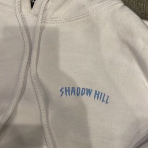 Shadow Hill white hoodie with light blue graphics